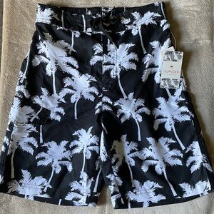 Islander Boys Trunk  Size: L/G 10/12 Colors: Black/ white